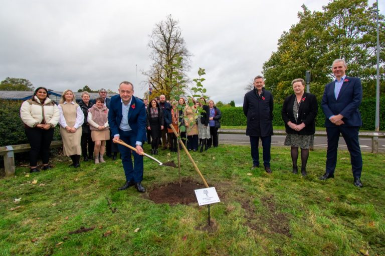 i2r plants tree in support of Queen’s Green Canopy initiative