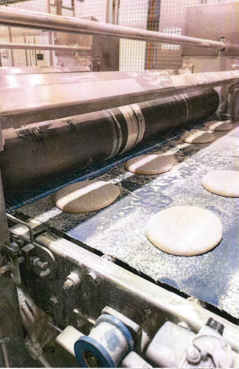 Pizza maker fined £800,000 after two workers caught up in machinery